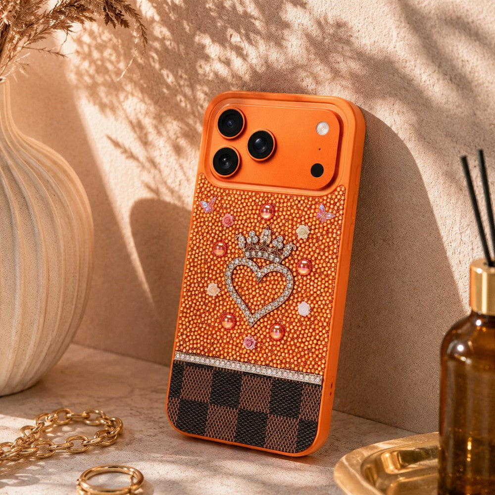 Vissel iPhone 17 Pro Uyumlu Taşlı Kalp Detaylı Kılıf – Parlak Taşlı, Darbe Emici Koruma, Şık & Trend Telefon Kılıfı, Turuncu